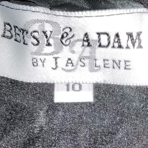 Black slim line evening gown with sparkle accent on left side shoulder. - Picture 5 of 5